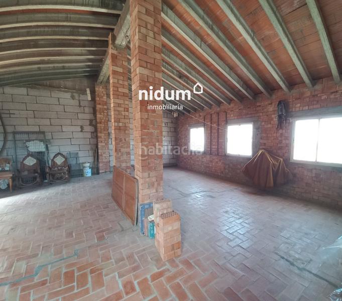 Foto b21cd3d2-e58a-46bd-ad15-e144cd2e51ff. Haus mit parking in Manuel