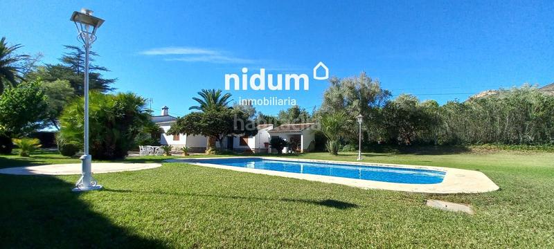 Foto c98ff03b-cbd7-44ce-9e98-547d1e675ad3. Chalet excelente chalet en venta con piscina, construido en planta baja sobre parcela rustica de 2.500m aprox. en Barxeta