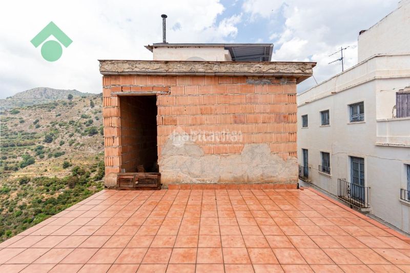 Foto 99545e5c-cfb1-4f9e-860d-05d9855ab158. Casa aparellada a Otívar