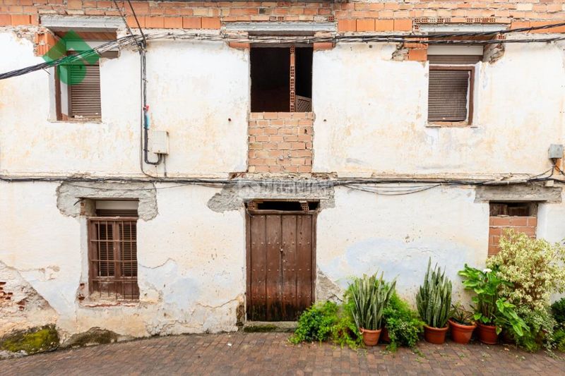 Foto cfa64b22-8ec0-41aa-96a0-97b64fe24650. Casa aparellada a Otívar