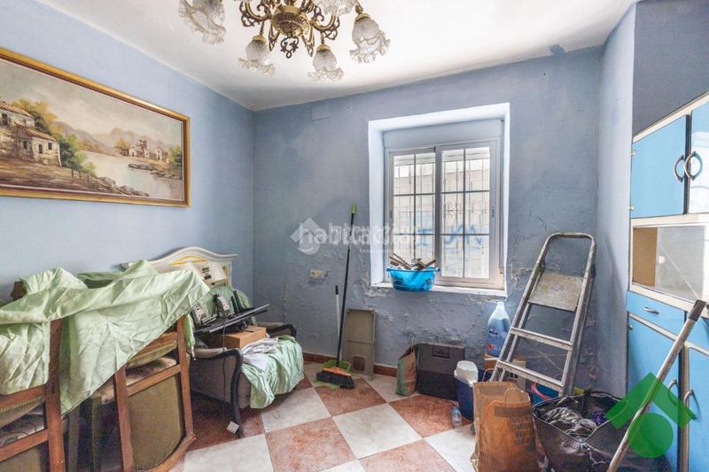 Foto bd18e6c9-223a-4d35-ae51-a6dde09eb371. Casa aparellada a Alfacar