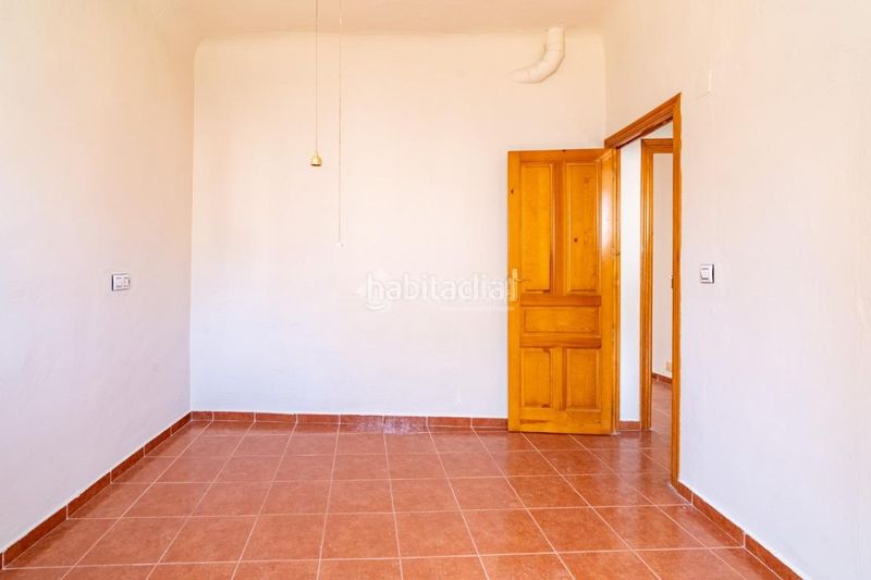 Foto 2ac05100-9cf2-4e63-8e23-221f7a768a68. Casa aparellada a Alfacar