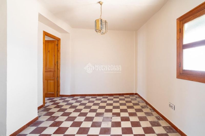 Foto 98e3ece4-aff1-409d-a821-4a4195bb6699. Casa aparellada a Alfacar