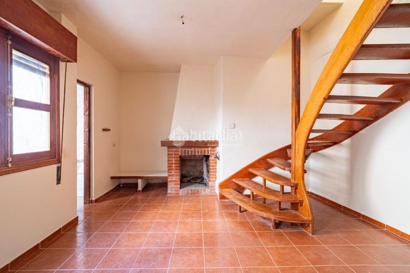 Foto f2697ffc-6225-4717-83a9-1ad751f50d93. Casa aparellada a Alfacar