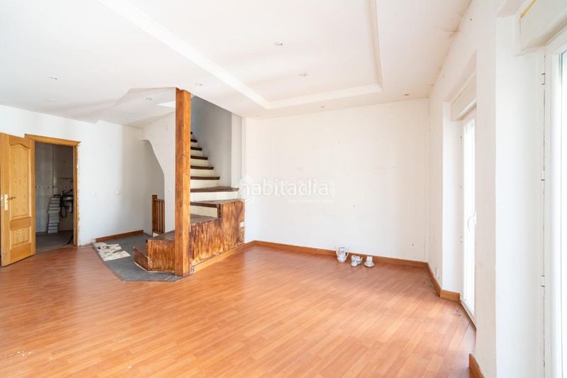Foto fbb063a7-c04b-4582-95a0-577d63e8f351. Casa aparellada a Alfacar