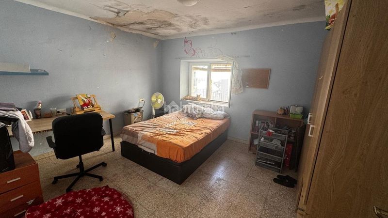 Foto 64986446-6f41-46ef-bf8e-34fe04c6d1da. Casa aparellada a Iznalloz