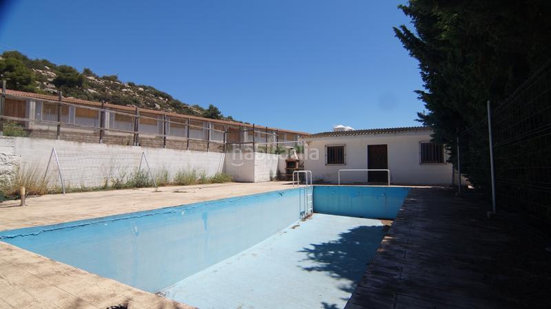 Foto 18a97cb5-e790-4371-91c3-b03cdbc8a6af. Bâtiment à usage industriel dans carrer calvari 43 dans Omellons (Els)