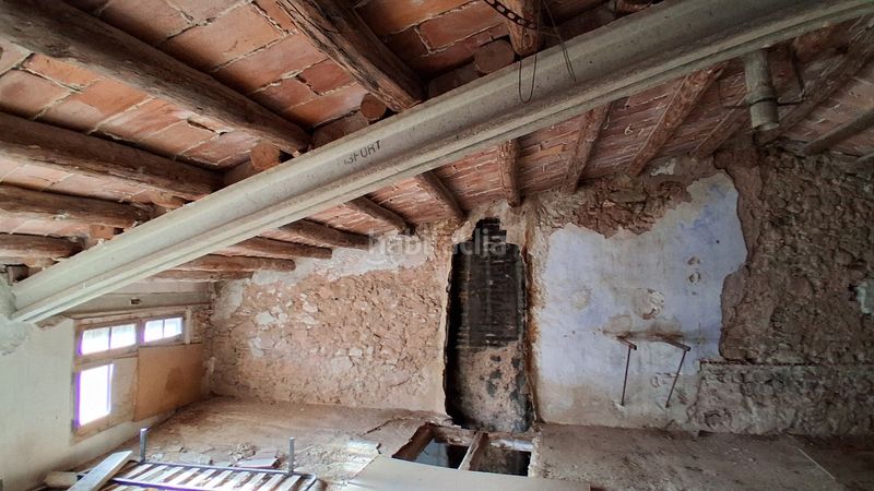 Foto 134a9624-3dd8-41fa-b031-9112f6f99e48. Casa pareada en carrer major 19 gran casa de piedra en la torre de fontaubella (priorat) en Torre de Fontaubella (La)