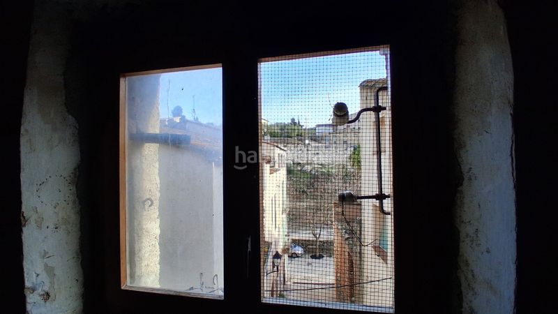 Foto f0be6cf6-3d9b-4a37-bba4-2c33938d1908. Casa pareada en carrer major 19 gran casa de piedra en la torre de fontaubella (priorat) en Torre de Fontaubella (La)