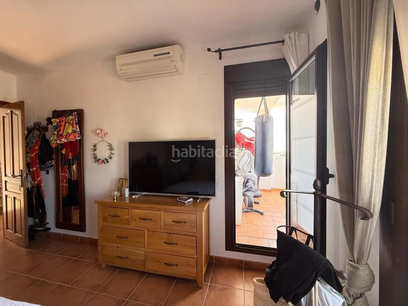 Foto 0f36ee65-4e66-417b-ab2f-01de51f89bf4. Casa adossada amb aparcament piscina a Fuente Alegre - El Chaparral - Los Morales Málaga