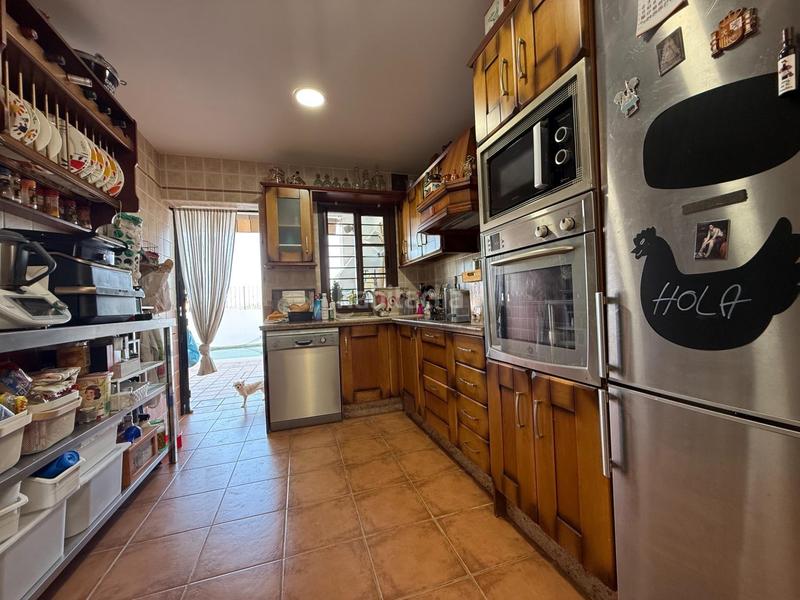 Foto c3a0911e-f23c-4907-a25b-00ce46228f0d. Casa adossada amb aparcament piscina a Fuente Alegre - El Chaparral - Los Morales Málaga