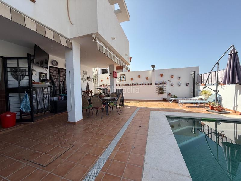 Foto ed93cffc-12b5-46a0-849f-46a014210683. Casa adossada amb aparcament piscina a Fuente Alegre - El Chaparral - Los Morales Málaga