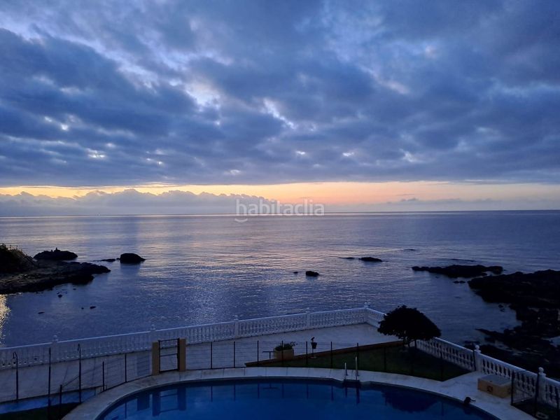 Foto 61fdd1f3-ed08-453c-80b4-cca31dc1b91a. Piso vivienda única en primerísima línea con vistas de crucero en Benalmádena