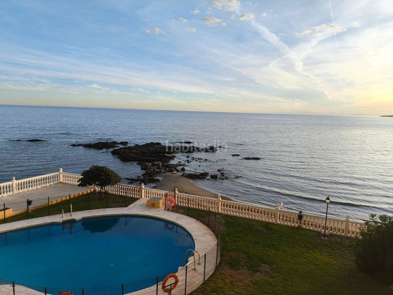 Foto 7a080128-29c0-4a6c-b33c-0a620ba3b7e5. Piso vivienda única en primerísima línea con vistas de crucero en Benalmádena