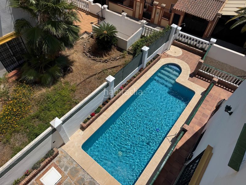 Foto 2b2d4b69-7740-4a98-97d4-22dfd1ec53c3. Casa aparellada amb calefacció aparcament piscina a Málaga