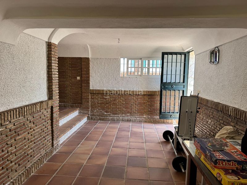 Foto b1cdad7a-8a72-4c1b-a364-617f9932bd38. Casa aparellada amb calefacció aparcament piscina a Málaga