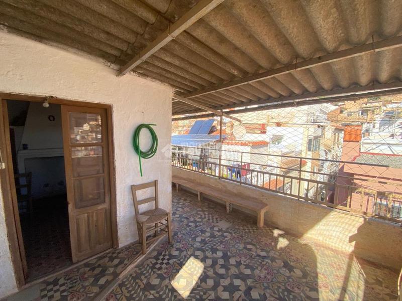 Foto b864baf8-ed6d-425b-bd39-c801ab1f3a31. Casa aparellada a Lanjarón