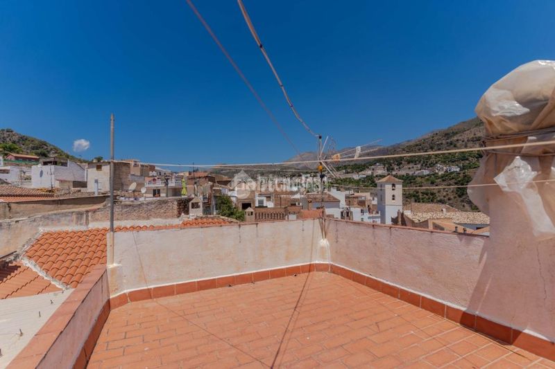 Foto 409da94a-c167-4aa2-9c8c-6a46a8ca7288. Casa aparellada a Guájares (Los)