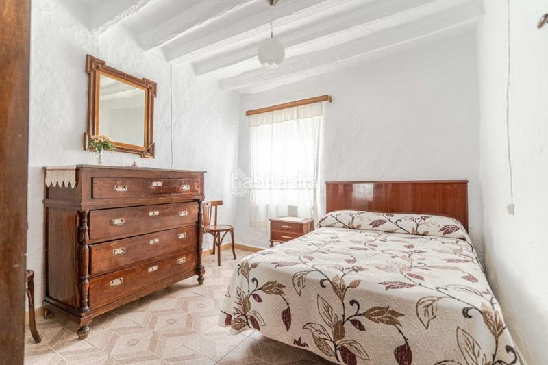 Foto 6ac7db85-cb44-4a15-b892-1a29bd514070. Casa aparellada a Guájares (Los)