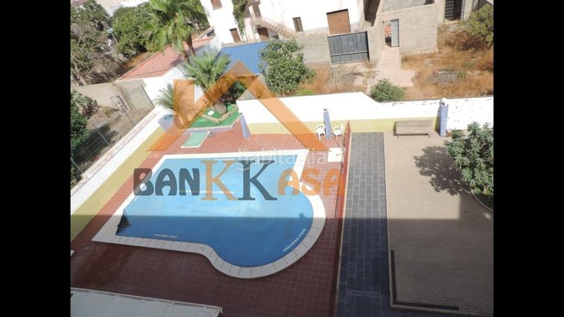 Foto 7f937ab3-4ba4-4d67-a8aa-bf4cb86c0de0. Piso se vende piso en urbanización con piscina en Dalías