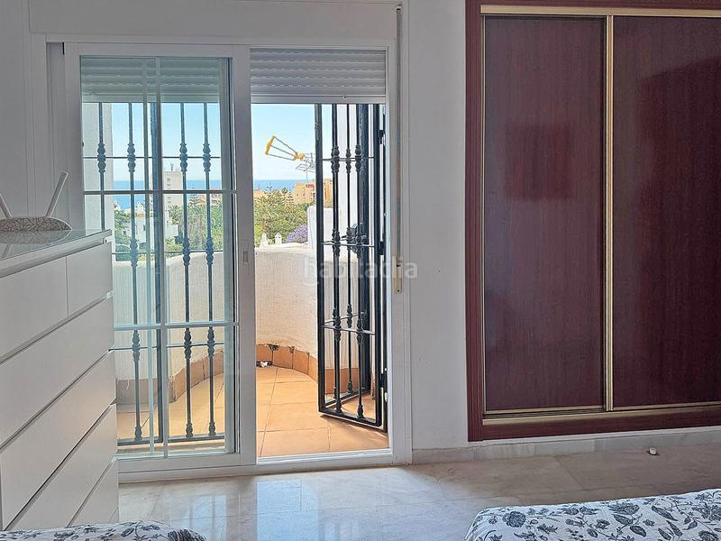 Foto e8e75b3e-1bc5-4324-a1d3-75bc9b05e202. Reihenhaus mit parking pool in Hacienda Torrequebrada Benalmádena