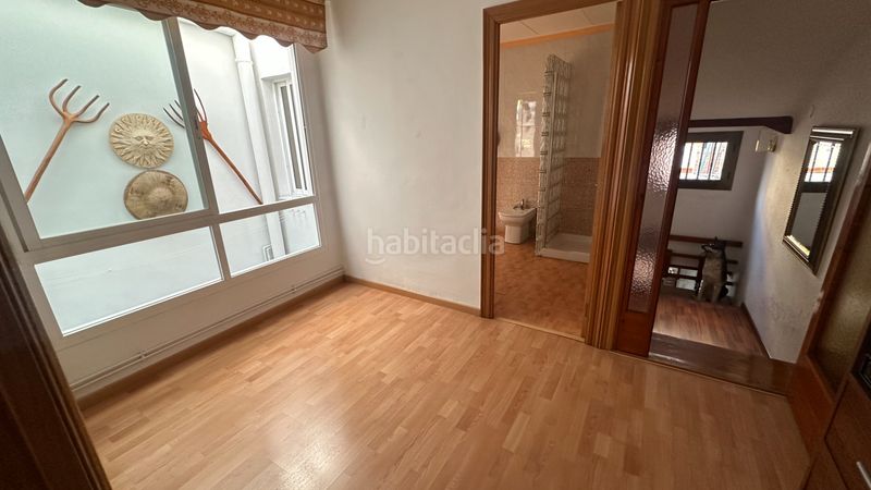 Foto 19d5bffc-d992-4922-907f-41a5f8982316. Casa adossada amb xemeneia calefacció a Casc Antic Ripollet