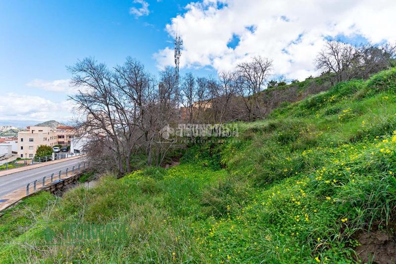 Foto bcef1b53-ceac-494a-8dfb-e06e9aae7c0e. Terreny residencial a Coín