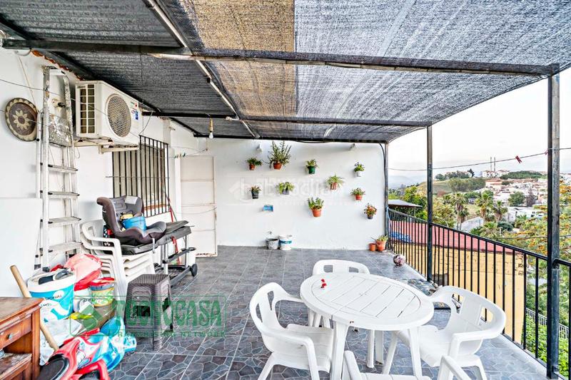 Foto 5226cefb-85d0-4c5b-82da-476cbf14d70e. Maison jumelée dans Coín