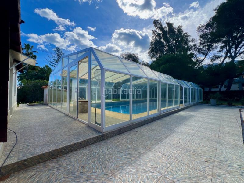 Foto e4a42487-02e9-49f6-8766-b88894415a82. Chalet mit heizung parking pool in Las Rotas / Les Rotes Dénia