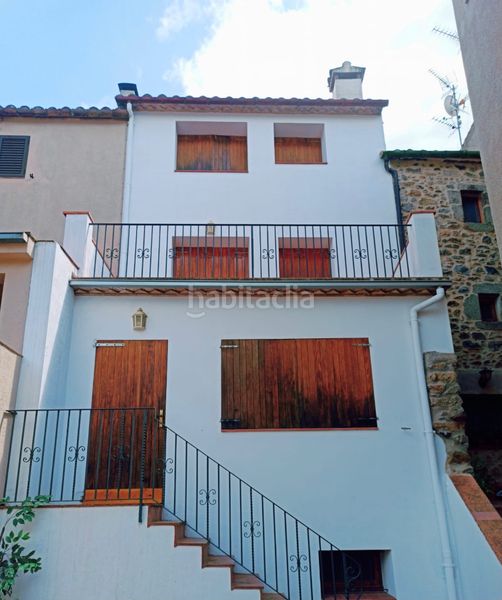 Foto 19fedd6f-a52e-4437-8f1b-3dcb99f524d0. Casa aparellada amb xemeneia calefacció aparcament a Maçanet de Cabrenys