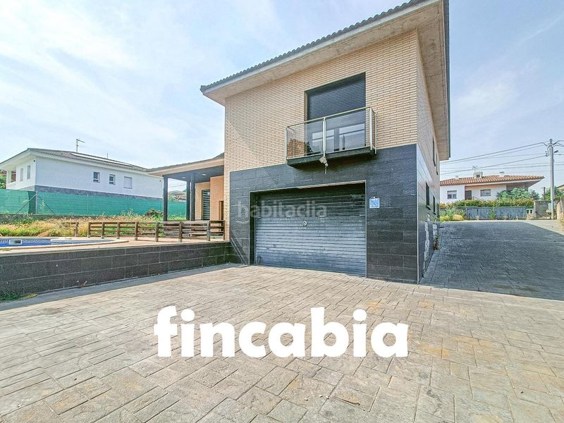 Foto c73780cf-e54f-41a9-8d36-e3b6bfdf7c13. Casa amb aparcament piscina a Caldes de Malavella