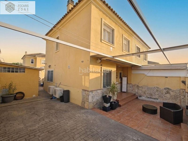 Foto 1485e9a8-327f-425e-a60c-c0ac3fb30fb8. Casa aparellada amb calefacció aparcament a Distrito Zeta - Recinto Ferial Cortijo de Torres Málaga