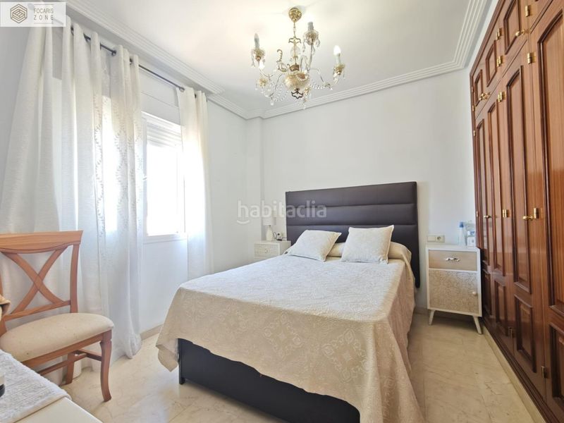 Foto 1d026d9f-7bf7-484c-8b2c-12d90631251a. Casa aparellada amb calefacció aparcament a Distrito Zeta - Recinto Ferial Cortijo de Torres Málaga