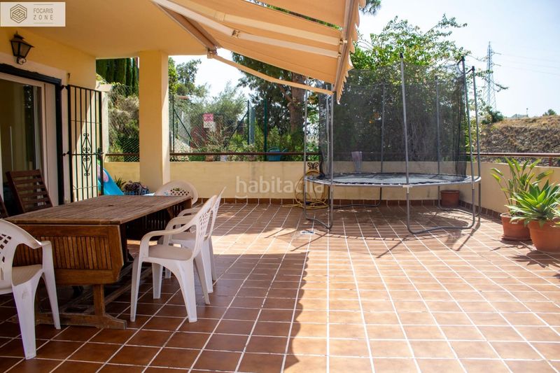 Foto 9a224e27-b1bf-4829-9d4a-5519e6bd762d. Casa aparellada amb calefacció aparcament piscina a Málaga