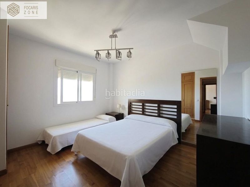 Foto bc28a94f-561d-40fa-a9ec-ca1d4b44db28. Casa aparellada amb calefacció aparcament piscina a Málaga