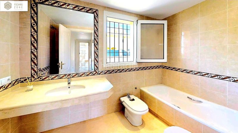 Foto 14885575-babf-406d-9d86-9ae0d27bdbc1. Casa aparellada amb calefacció aparcament piscina a Mijas