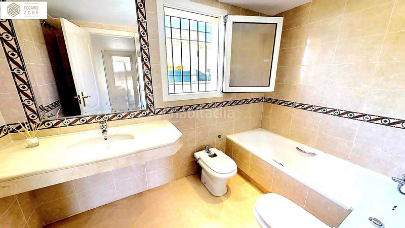 Foto 902bbccd-b4a7-485b-8f37-e1b492fbda8e. Casa aparellada amb calefacció aparcament piscina a Mijas