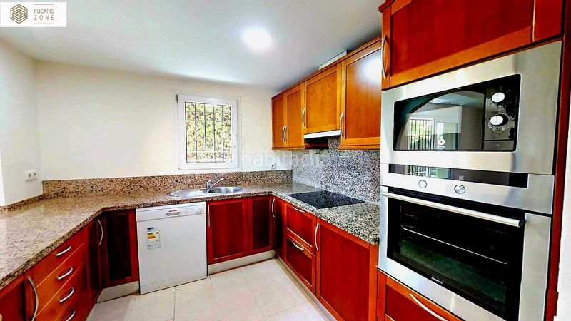 Foto c49f7c82-615b-4c9e-b932-64e279ac601e. Casa aparellada amb calefacció aparcament piscina a Mijas