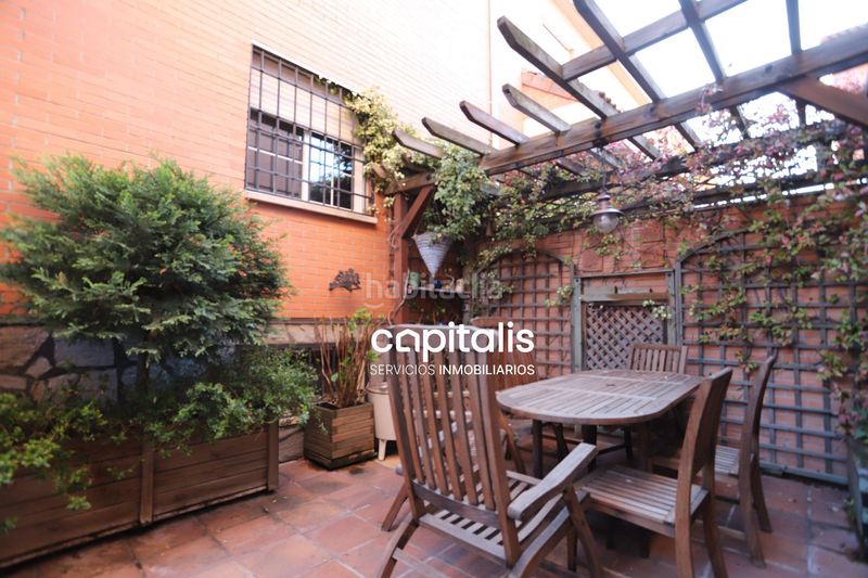 Foto f3888bef-bce8-4598-8a72-40402d20f805. Casa amb calefacció piscina a Ensanche Alcalá de Henares