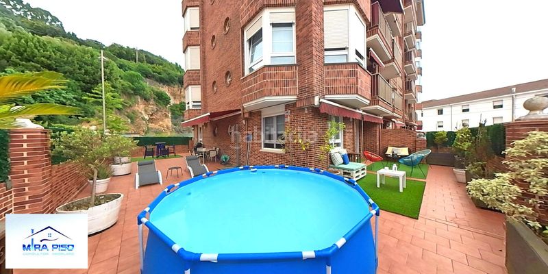 Foto b7e1cdd3-d812-41cb-9cec-cb02dbb95e2c. Planta baixa amb calefacció a Santoña