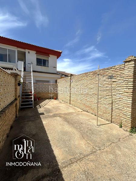Foto 42da1631-d6d7-4a7e-978e-faa40044a2d0. Casa adossada amb aparcament a Coto Almonte