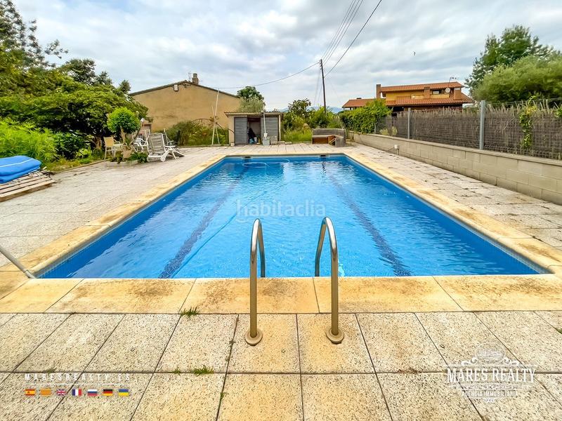 Foto 7e6b1dec-41a8-48c8-8c0f-55b558691cc4. Casa se vende gran casa rural con piscina y jardín urbanización vallcanera park. en Sils
