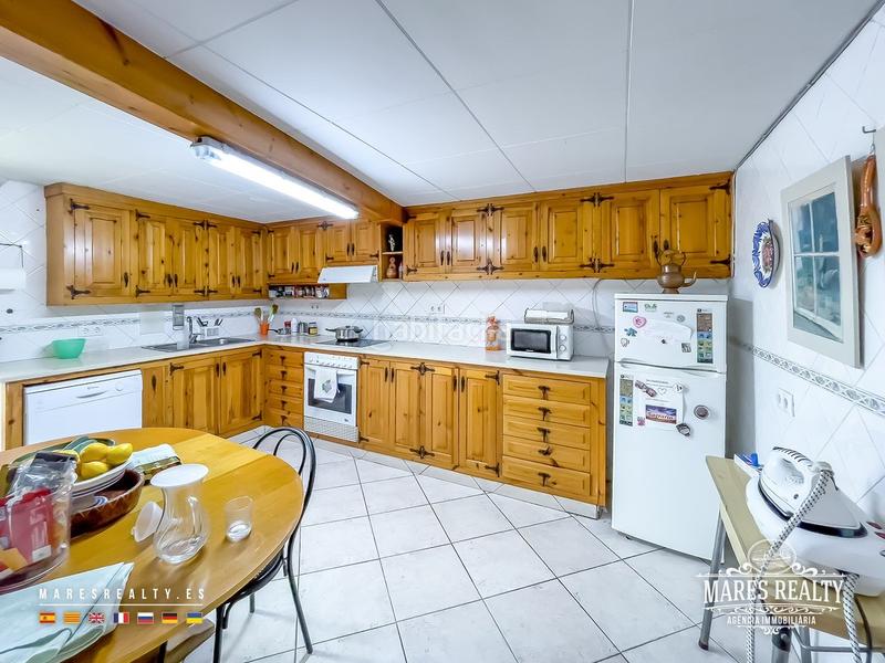 Foto c9ed5605-d175-48b0-ac0a-e82c3f2bf348. Casa se vende gran casa rural con piscina y jardín urbanización vallcanera park. en Sils