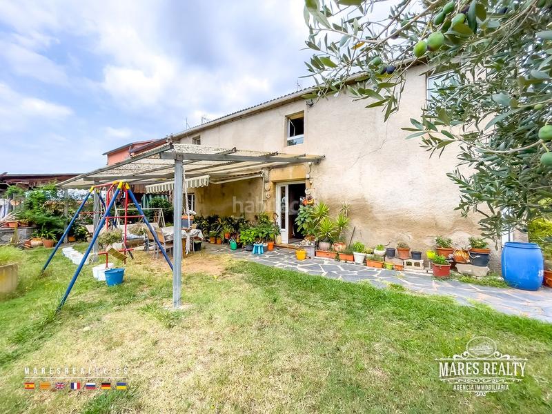 Foto ce6ddb81-7898-4a4c-818c-5e485a2977bb. Casa se vende gran casa rural con piscina y jardín urbanización vallcanera park. en Sils