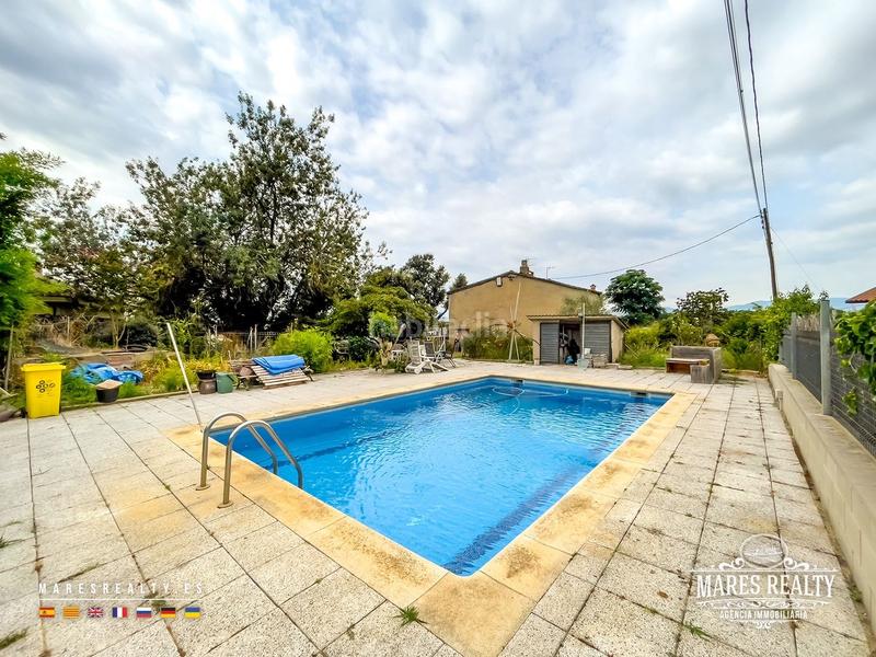 Foto e200f53a-3706-4f54-a885-8e382b91f7aa. Casa se vende gran casa rural con piscina y jardín urbanización vallcanera park. en Sils