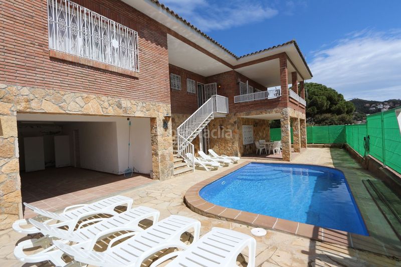 Foto b4f87763-1d90-4b43-9fb2-28e7568e3054. Casa amb calefacció aparcament piscina a Canyelles Lloret de Mar