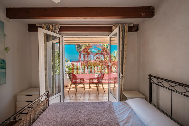 Foto f25f2daf-c7d8-4869-8eb4-d6794304da19. Chalet  con piscina en binibeca vell en Binibèquer Sant Lluís
