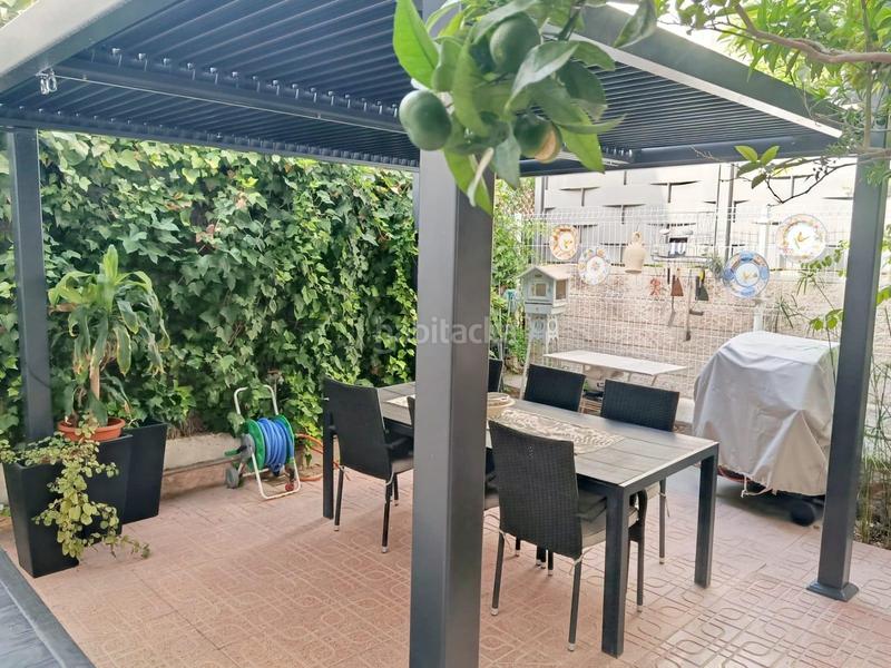 Foto 298e62b1-76d1-4d53-a4dd-54ea84761939. Casa aparellada amb aparcament a Sutullena Lorca