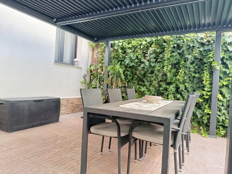 Foto 41980e7f-3c1f-4bb7-a6e7-8c91ca40680c. Casa aparellada amb aparcament a Sutullena Lorca