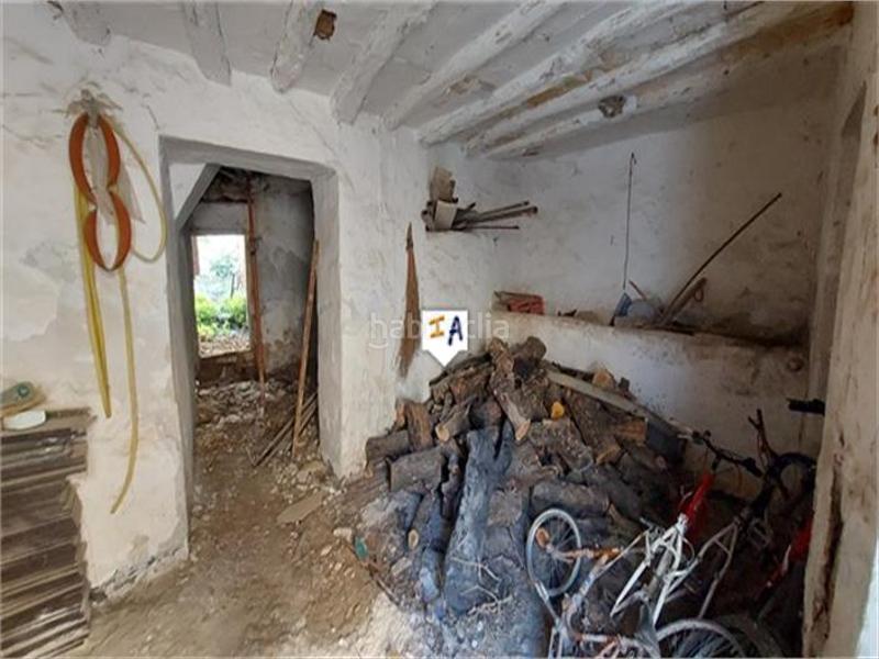 Foto 0ce78c0e-f572-480b-9edf-1c8716314b55. Casa adossada amb aparcament a Luque